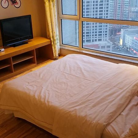 Dalian Yidian Yijing Huayuan Apartment الغرفة الصورة