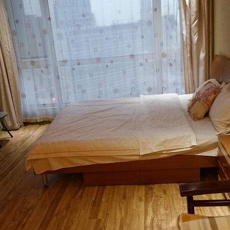 Dalian Yidian Yijing Huayuan Apartment الغرفة الصورة