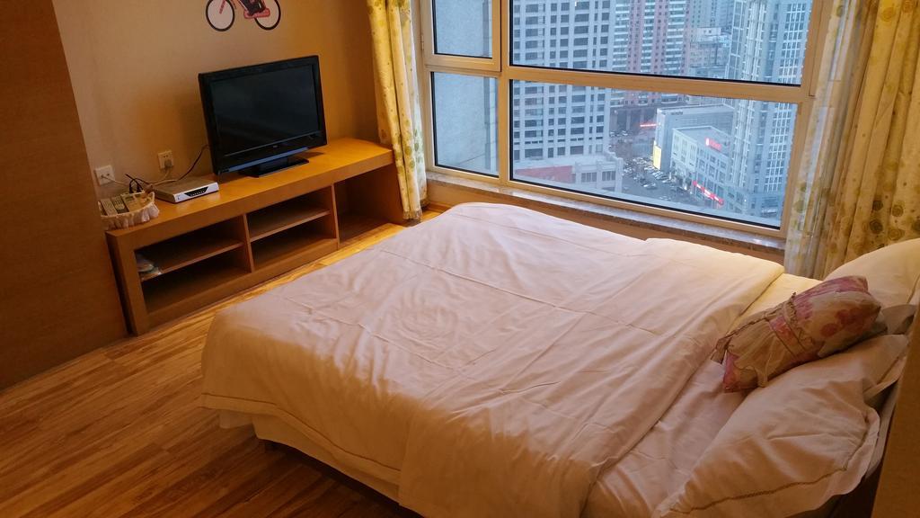 Dalian Yidian Yijing Huayuan Apartment الغرفة الصورة